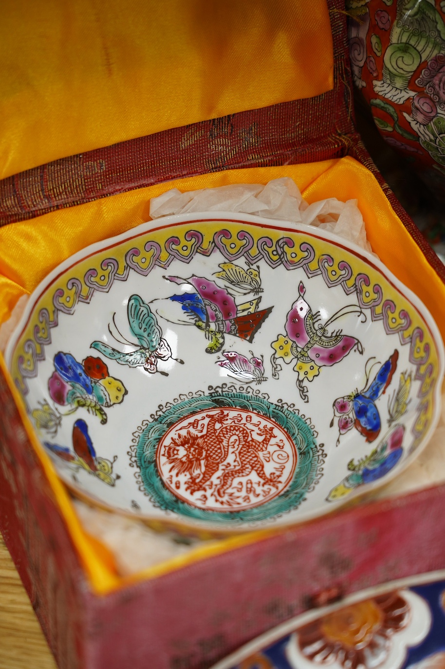 A collection of Chinese porcelain to include twin handled vase and cover, ‘dragon’ bowl and plate, largest 33cm in diameter. Condition - fair to good